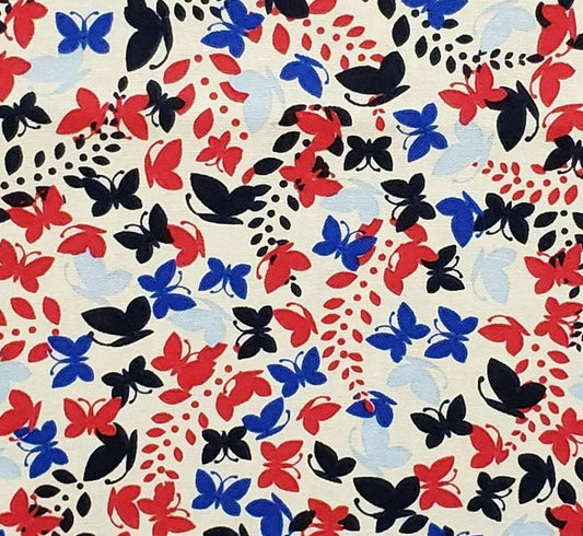 JoAnn Fabric - Quilters Showcase Cream Fabric with Red and Blue Butterfly Print