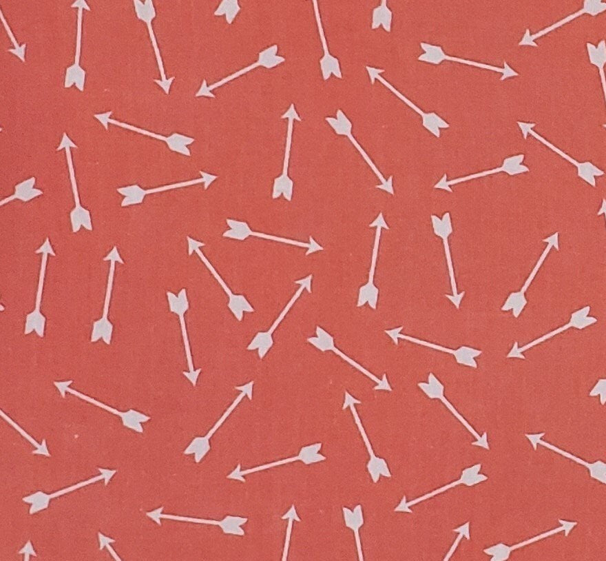 JoAnn Fabric - Coral Fabric / Tossed White Arrow Pattern