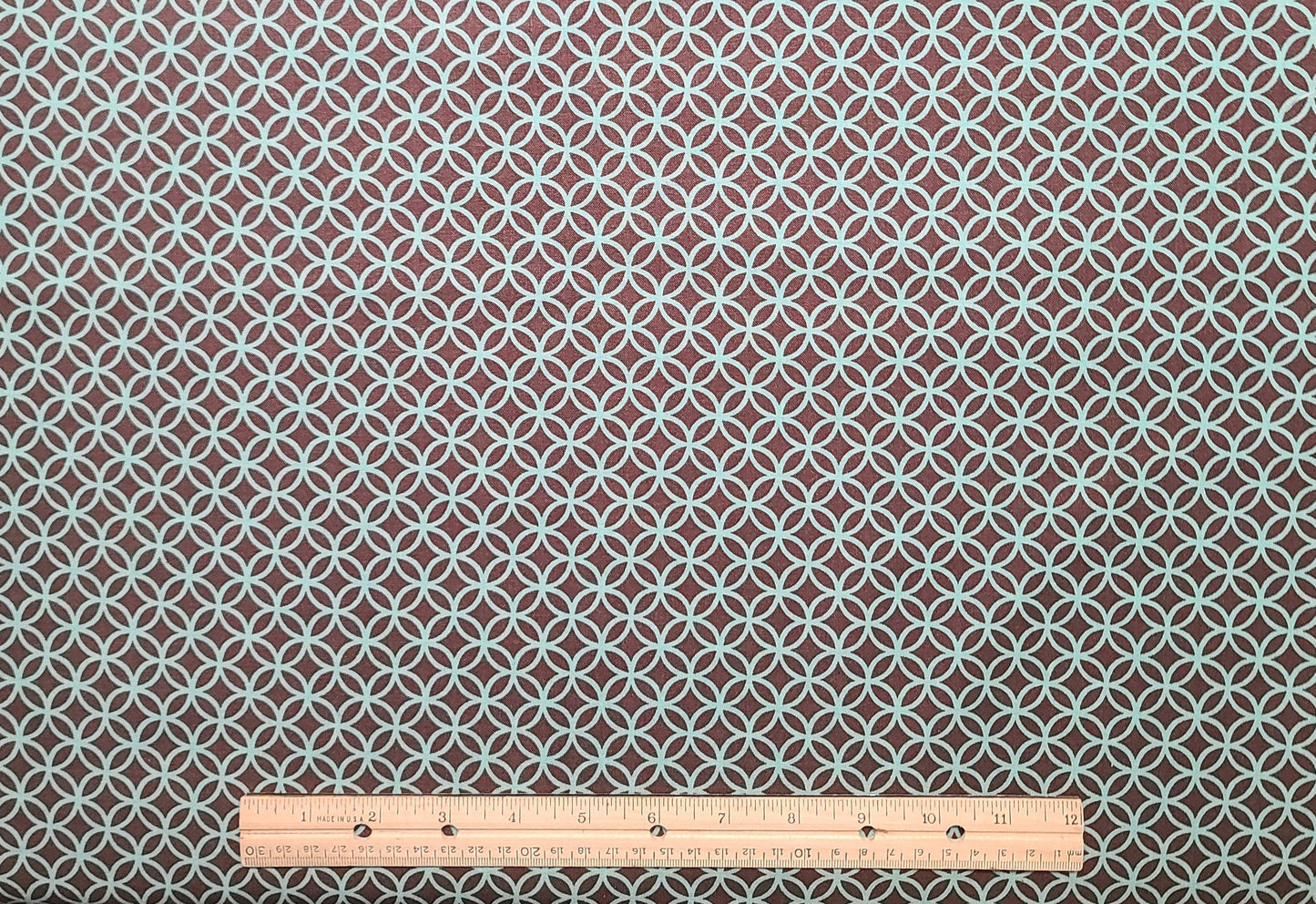 Designed and Produced Exclusively for Joann Fabric and Craft Stores - Dark Brown Fabric / Aqua Concentric Circle Print