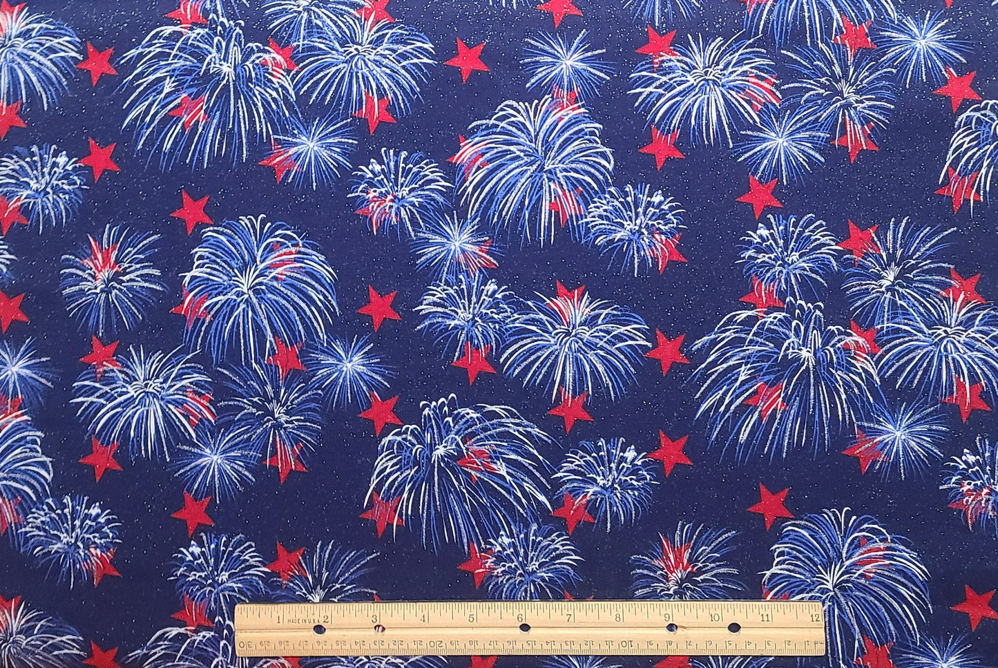 Fabric Traditions 2004 - Dark Blue Fabric / Medium Blue and White "Fountain Fireworks" Print / Dark Red Stars / Silver Glitter