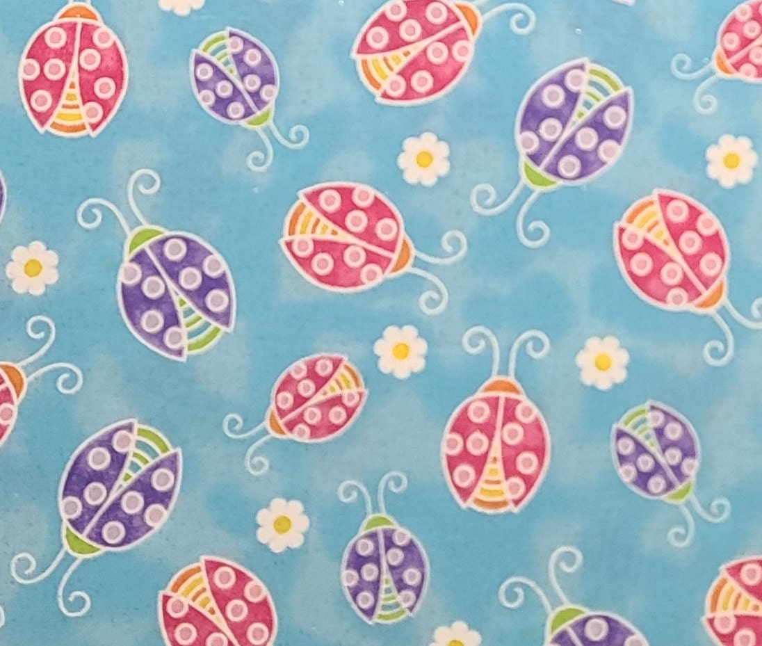 Fabric Traditions 2008 - Bright Blue Tonal Fabric / Brightly Colored Lady Bug Print / White and Yellow Flower / Allover Silver Glitter