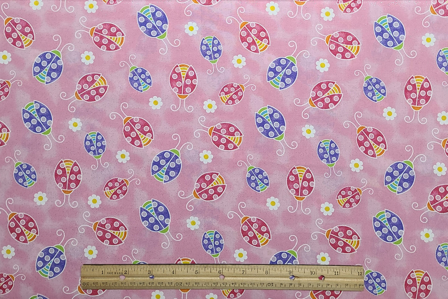 Fabric Traditions 2008 - Pink Tonal Fabric / Brightly Colored Lady Bug Print / White and Yellow Flower / Allover Silver Glitter