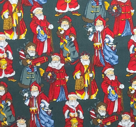 The Alexander Henry Collection - Dark Green Fabric / Father Christmas Print in Red, Blue and Green