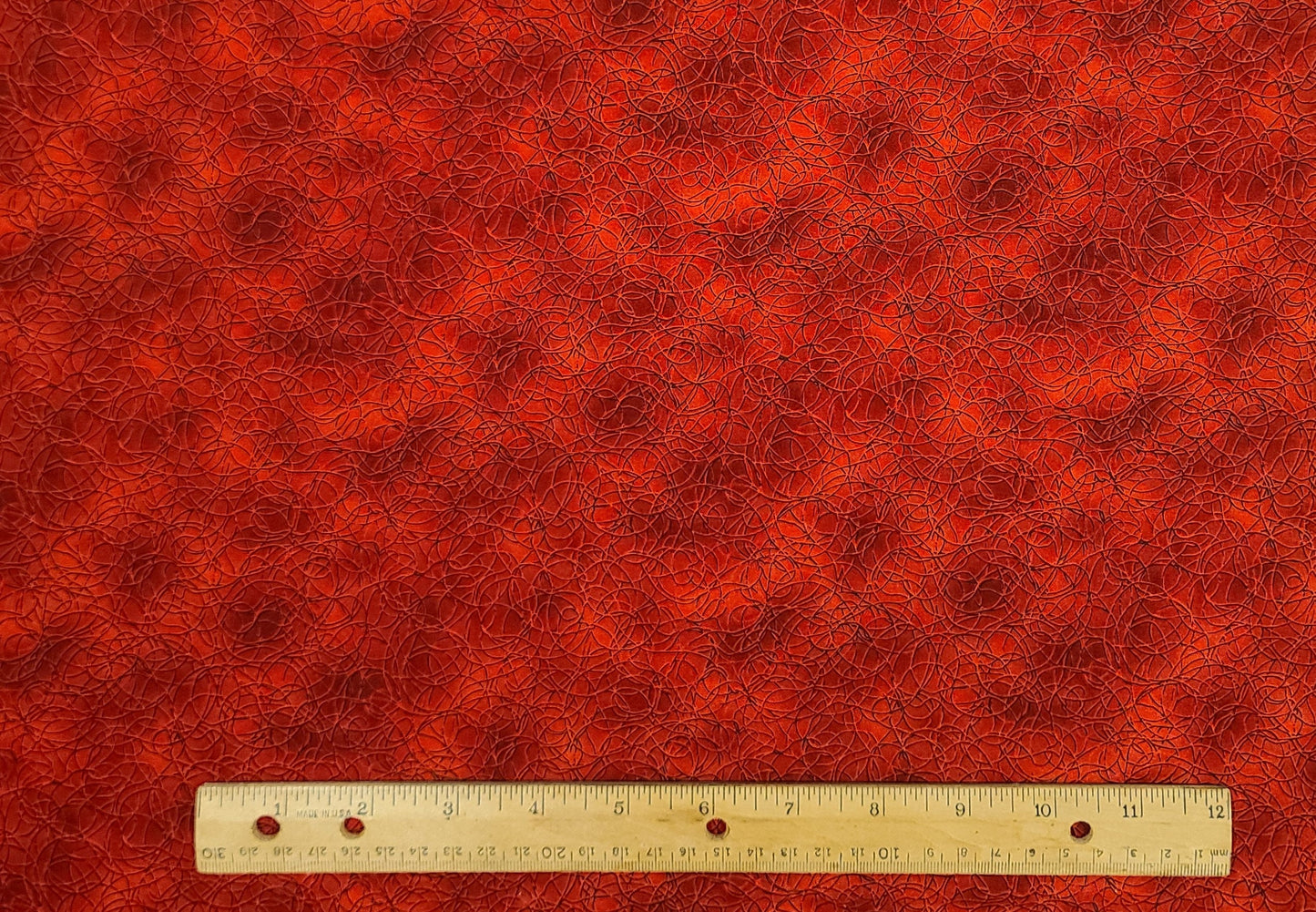Dimensions Style #C774 by Hoffman California International Fabrics - Dark Red and Orange Tonal Fabric / Black Pattern