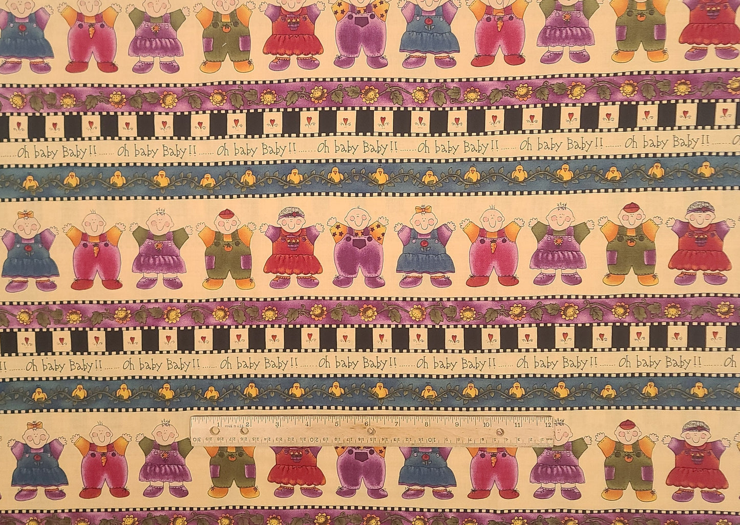 KP Kids & Co by Kari Pearson for SSI - Oh Baby Baby!! - Border Stripe (Parallel to Selvage) Fabric / Dark Cream / Purple, Pink, Teal, Green