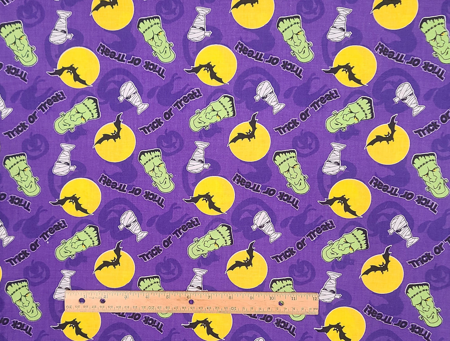 Purple Fabric/Purple Silhouette Cat, Jack-O-Lantern/Bright Yellow Full Moon with Black Bat/Green Frankenstein Face/Mummy Face/Trick or Treat