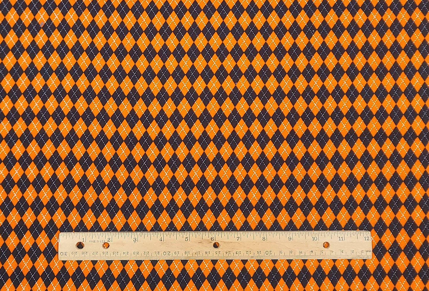 EOB - Designed and Produced Exclusively for JoAnn Fabric and Craft Stores - Black, Orange and White Argyle Print Fabric