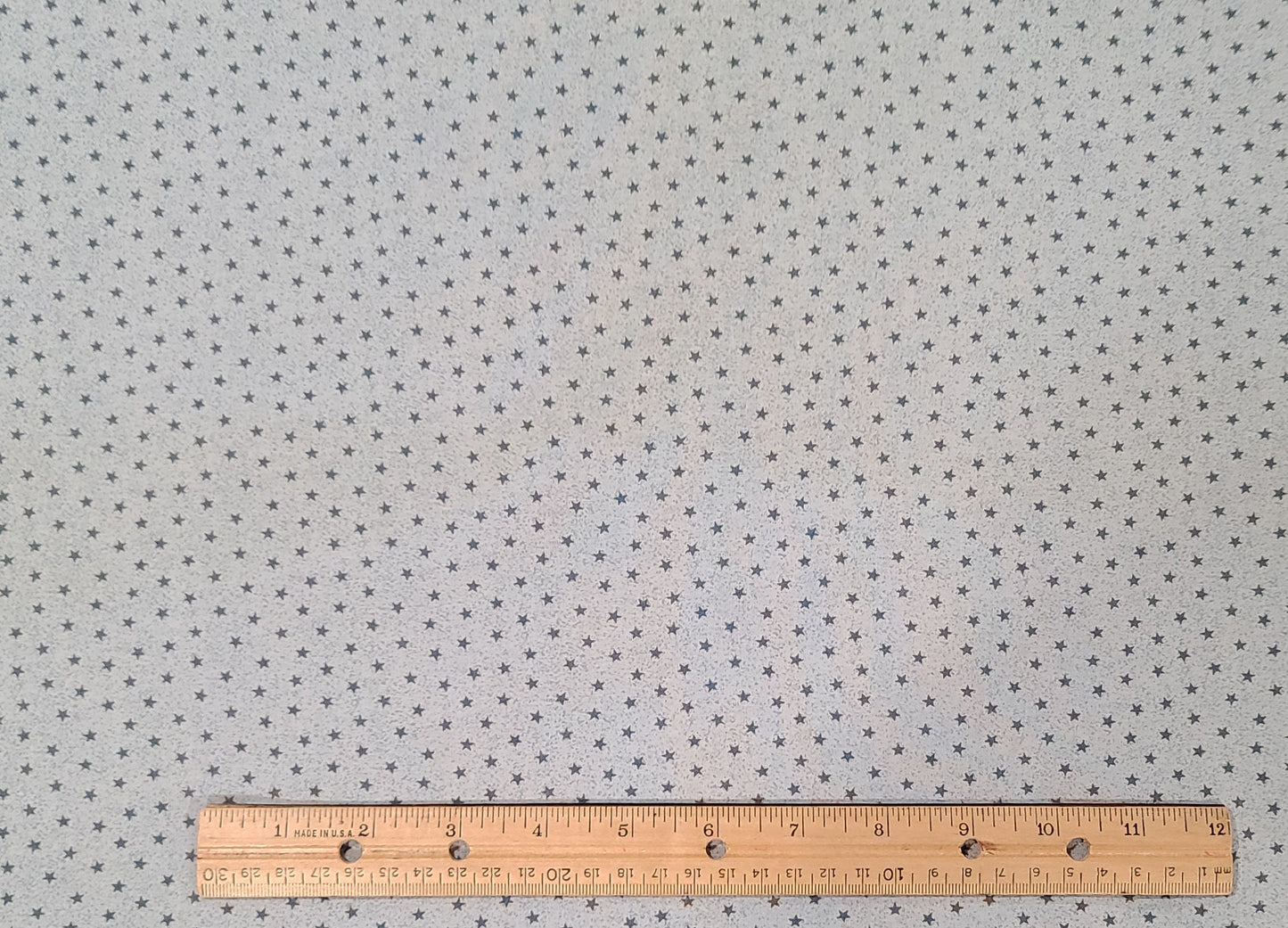 Pale Blue Fabric with "Sponged" Background / Medium Blue Scattered Star Print