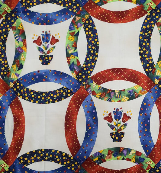 Suzie Q Quilter by Fabri-Quilt Inc PATT 7743 - Ecru Fabric / Red, Blue, Bright Green and Yellow Double Wedding Ring and Tulip Print