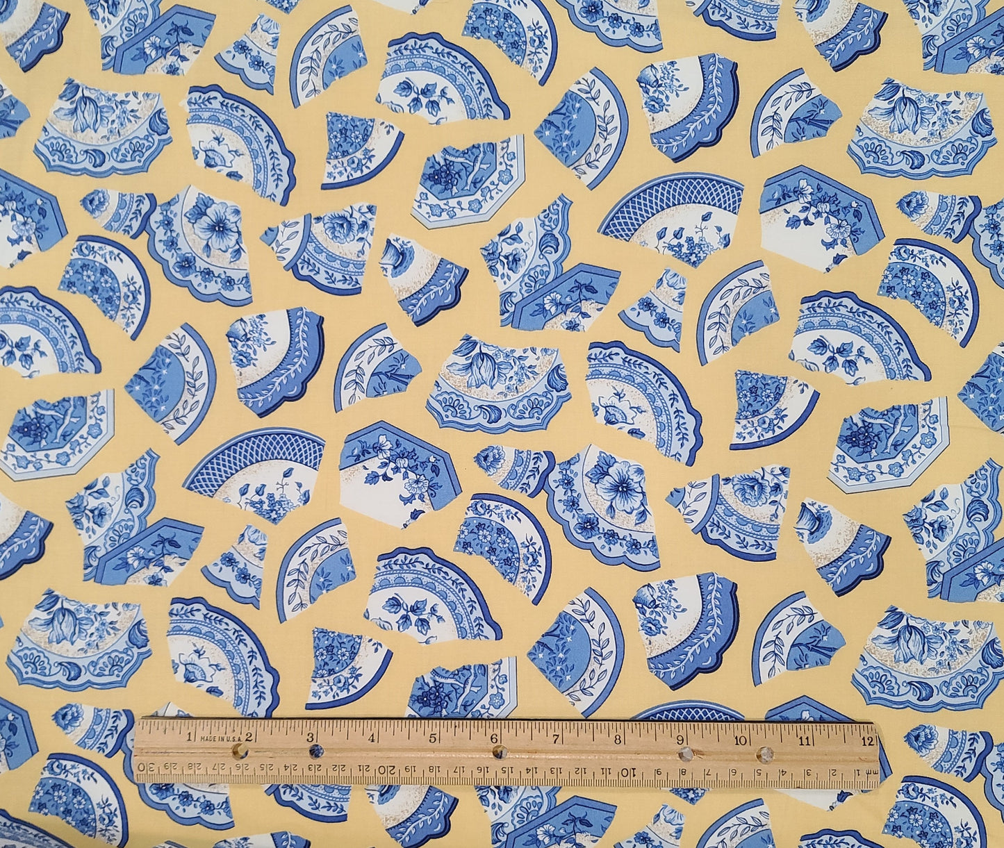 TAF Textiles Art & Film Inc - Light Gold Fabric / Blue and White "Delft" Pattern Broken Plate Print