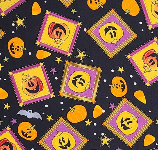 JoAnn Fabrics - Black Fabric / Purple, Green and Yellow Halloween Block, Star and Jack-O-Lantern Print