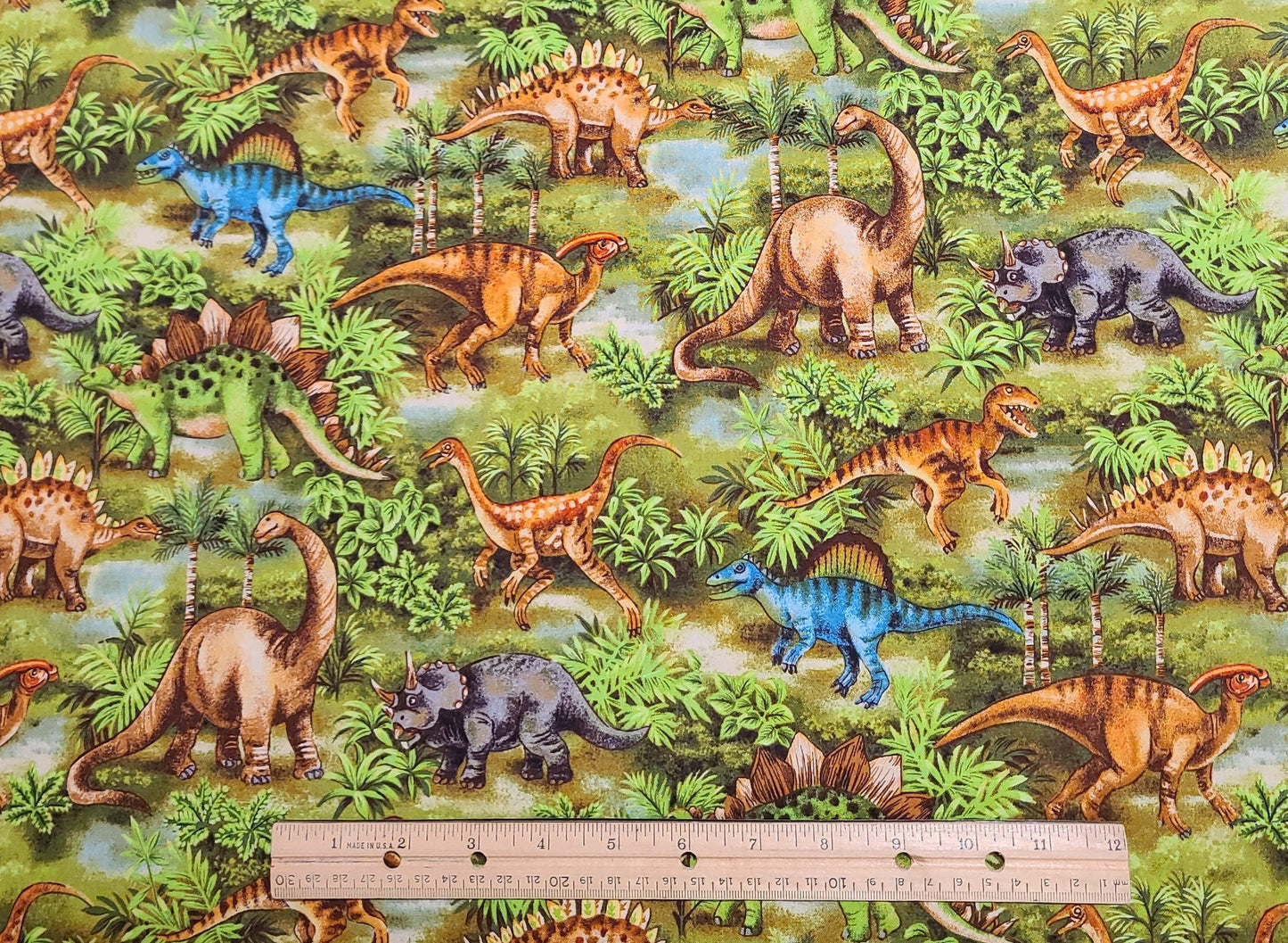 JoAnn Fabrics - Dinosaur Print Fabric / Bright Green Tonal Leaves