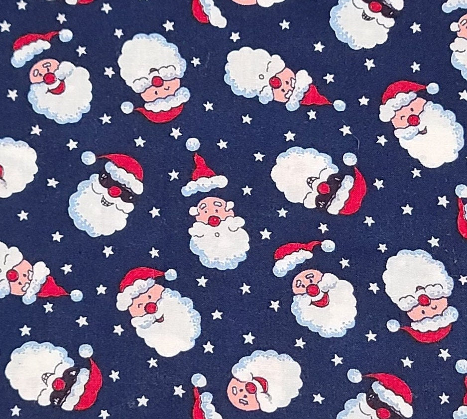 Dark Blue Fabric / White Star and Funny Santa Face Print - Selvage to Selvage Print