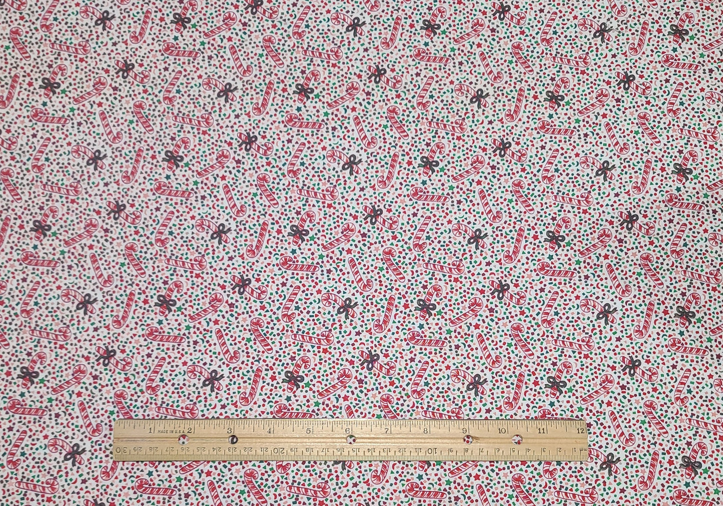 White Fabric / Red, Pink and Green Confetti and Tossed Candy Cane Print - Selvage to Selvage Print