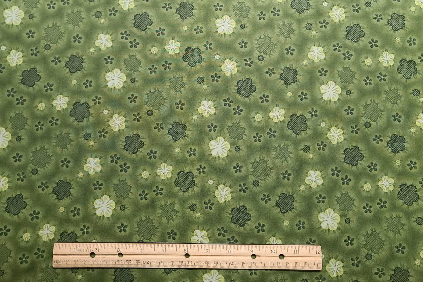 Kona Bay Fabrics 2008 Design: NOBU-24 - Olive Green Tonal Fabric / Dark Green, White Flower Print