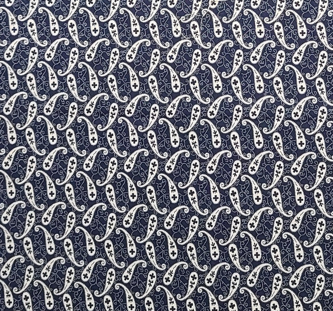 Marcus Bros Textiles Inc - Dark Blue Fabric / White Paisley and Micro Dot Print