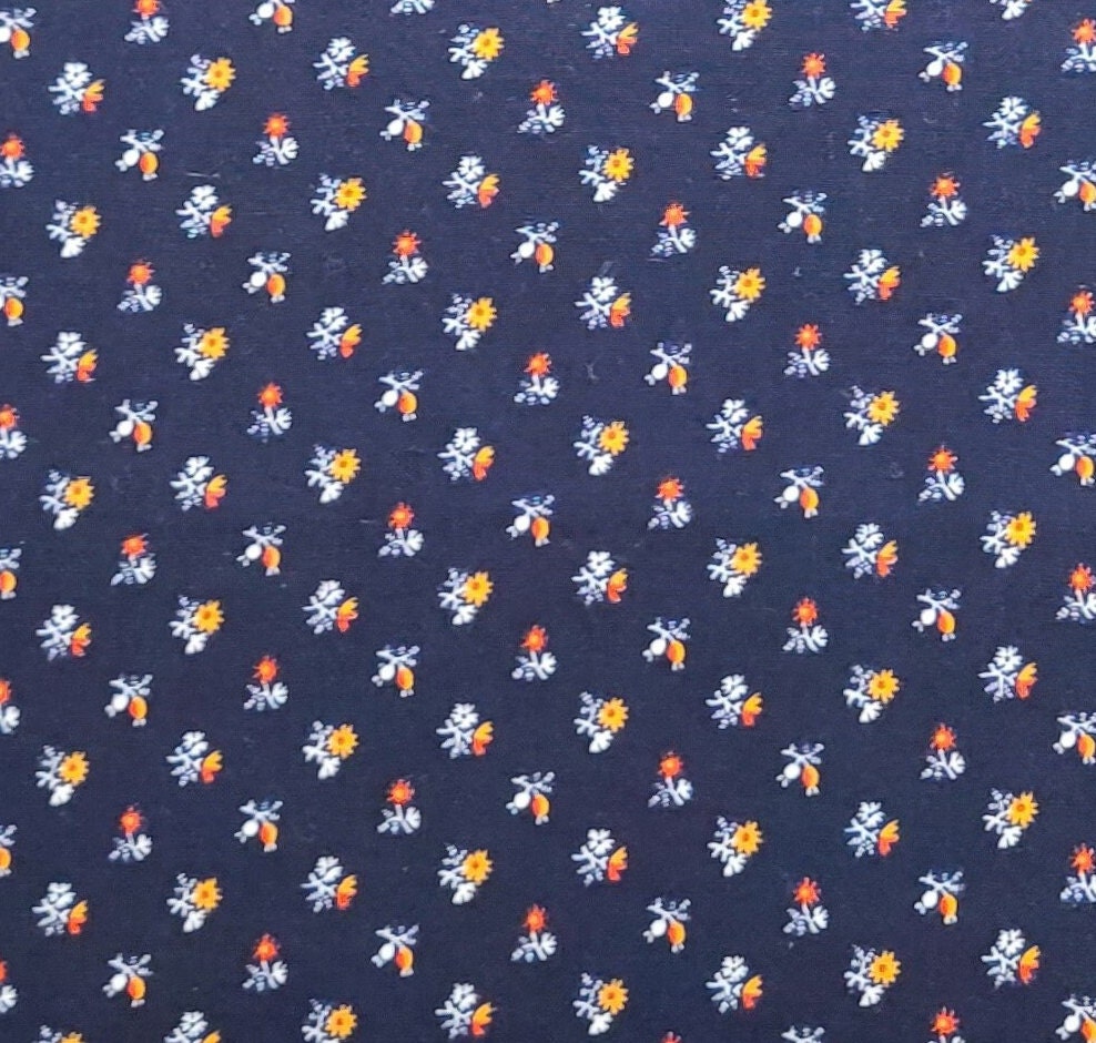 Peter Pan Fabrics Inc - Dark Blue Fabric / Red, Yellow and White Flower Print