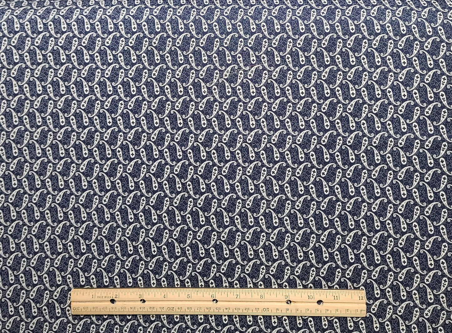 Marcus Bros Textiles Inc - Dark Blue Fabric / White Paisley and Micro Dot Print