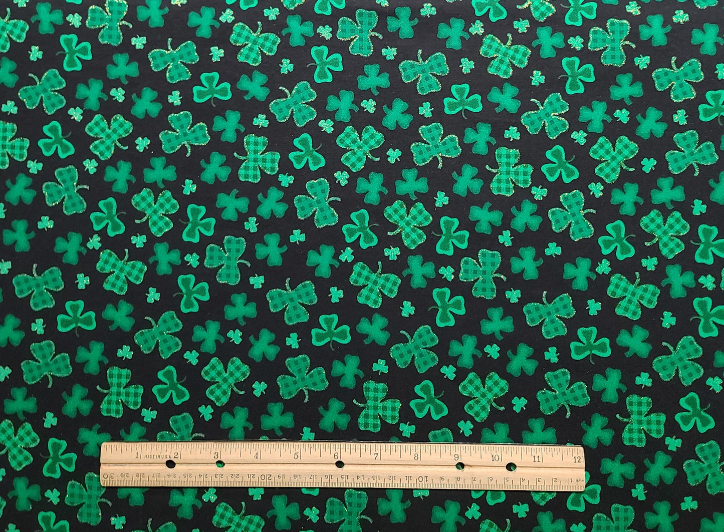 Black Fabric / Green and Plaid Shamrock Print / Green Glitter Accents - Selvage to Selvage Print