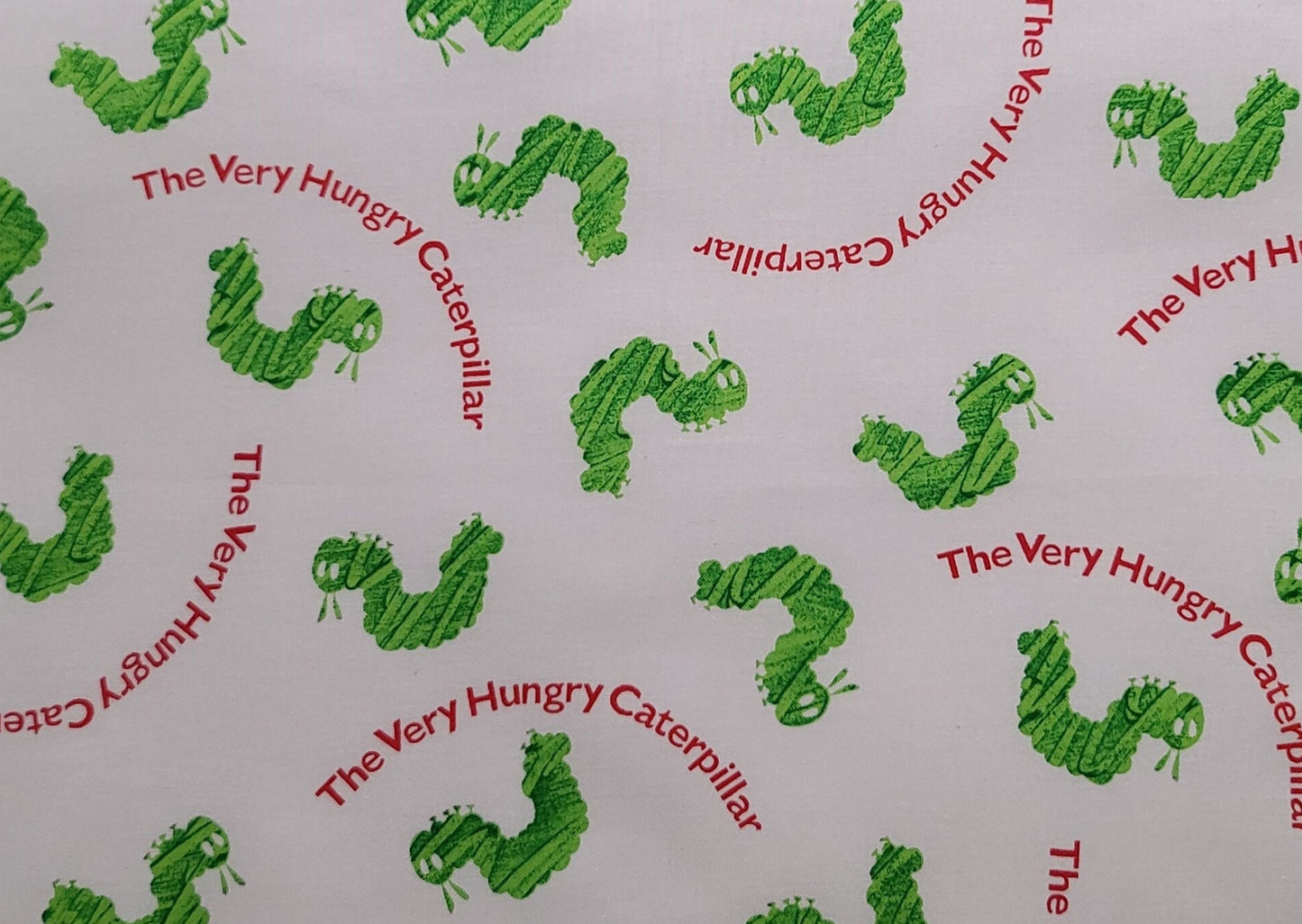 The Very Hungry Caterpillar Eric Carle LLC Andover Fabrics Patt#3473 - White Fabric / Bright Green Caterpillar / Red Script