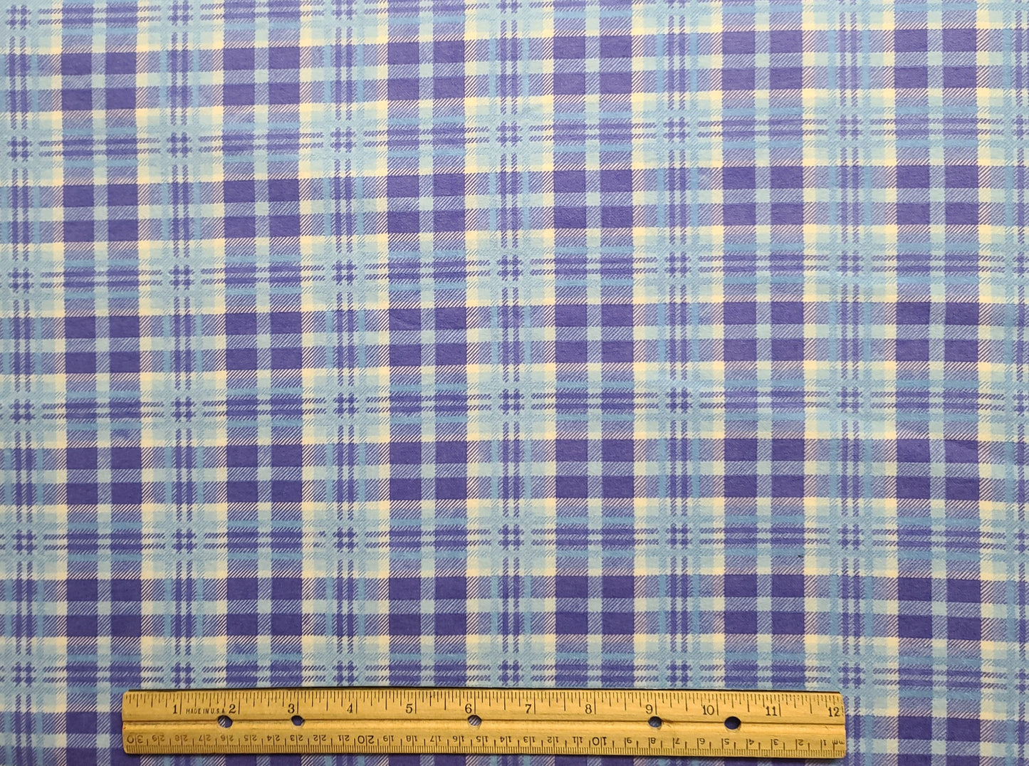 FLANNEL - Marcus Brothers Textiles Inc - Purple, Light Blue, White Plaid Fabric